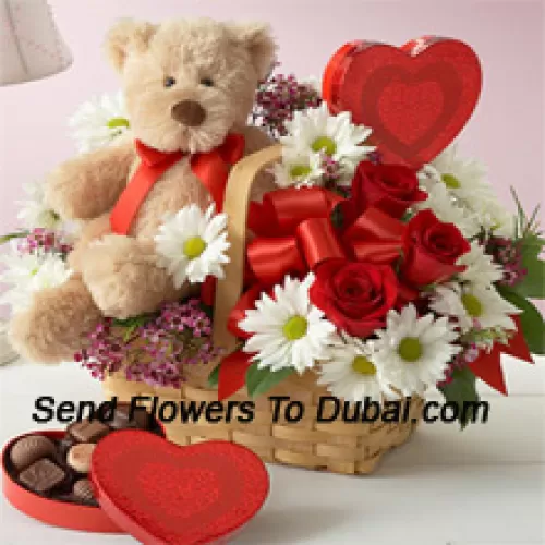 <b>Product Description</b><br><br>A Beautiful Basket Made Of Red Roses, White Gerberas And Seasonal Fillers, An Imported Box Of Chocolate And A Cute Brown Teddy Bear<br><br><b>Delivery Information</b><br><br>* The design and packaging of the product can always vary and is subject to the availability of flowers and other products available at the time of delivery.<br><br>* The "Time selected is treated as a preference/request and is not a fixed time for delivery". We only guarantee delivery on a "Specified Date" and not within a specified "Time Frame".