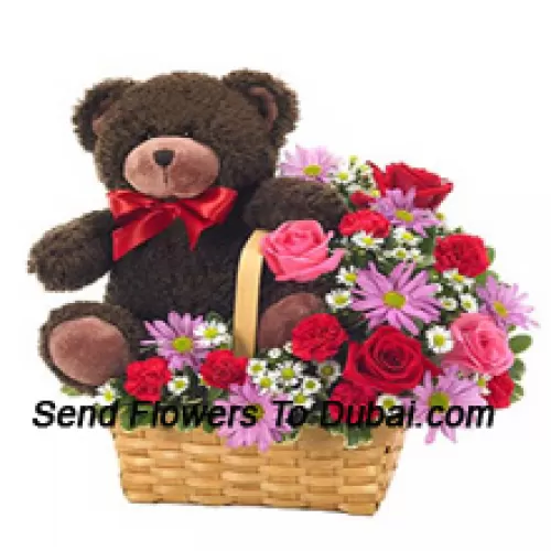 <b>Product Description</b><br><br>A Beautiful Basket Made Up Of Red And Pink Roses, Red Carnations And Other Assorted Purple Flowers Along With A Cute 14 Inches Tall Teddy Bear<br><br><b>Delivery Information</b><br><br>* The design and packaging of the product can always vary and is subject to the availability of flowers and other products available at the time of delivery.<br><br>* The "Time selected is treated as a preference/request and is not a fixed time for delivery". We only guarantee delivery on a "Specified Date" and not within a specified "Time Frame".