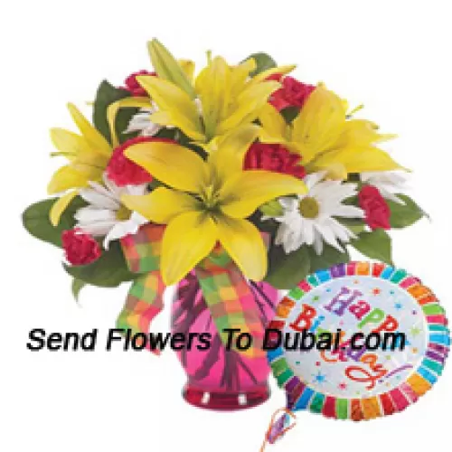 <b>Product Description</b><br><br>Red Carnations, Yellow Lilies And White Gerberas In A Glass Vase Accompanied With A "Birthday" Helium Balloon<br><br><b>Delivery Information</b><br><br>* The design and packaging of the product can always vary and is subject to the availability of flowers and other products available at the time of delivery.<br><br>* The "Time selected is treated as a preference/request and is not a fixed time for delivery". We only guarantee delivery on a "Specified Date" and not within a specified "Time Frame".