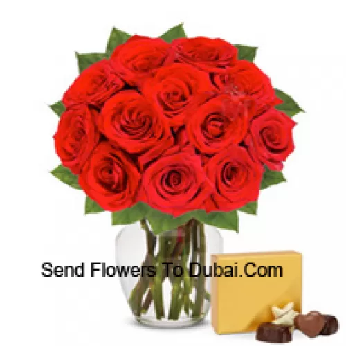<b>Product Description</b><br><br>12 Red Roses With Some Ferns In A Glass Vase Accompanied With An Imported Box Of Chocolates<br><br><b>Delivery Information</b><br><br>* The design and packaging of the product can always vary and is subject to the availability of flowers and other products available at the time of delivery.<br><br>* The "Time selected is treated as a preference/request and is not a fixed time for delivery". We only guarantee delivery on a "Specified Date" and not within a specified "Time Frame".
