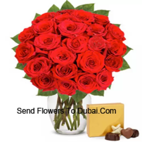<b>Product Description</b><br><br>30 Red Roses With Some Ferns In A Glass Vase Accompanied With An Imported Box Of Chocolates<br><br><b>Delivery Information</b><br><br>* The design and packaging of the product can always vary and is subject to the availability of flowers and other products available at the time of delivery.<br><br>* The "Time selected is treated as a preference/request and is not a fixed time for delivery". We only guarantee delivery on a "Specified Date" and not within a specified "Time Frame".