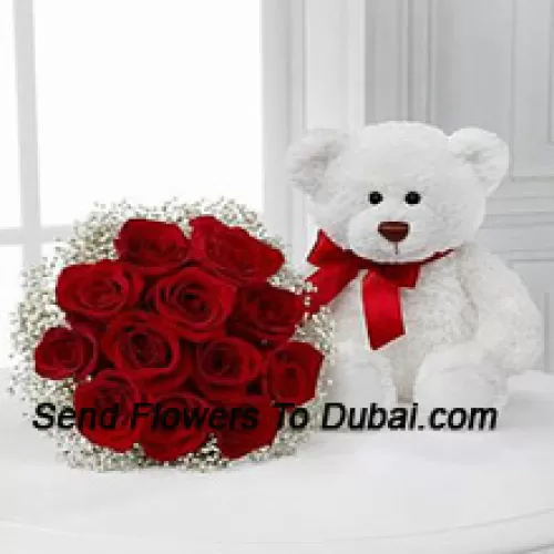 <b>Product Description</b><br><br>Bunch Of 12 Red Roses With Seasonal Fillers Along With A Cute 14 Inches Tall White Teddy Bear<br><br><b>Delivery Information</b><br><br>* The design and packaging of the product can always vary and is subject to the availability of flowers and other products available at the time of delivery.<br><br>* The "Time selected is treated as a preference/request and is not a fixed time for delivery". We only guarantee delivery on a "Specified Date" and not within a specified "Time Frame".