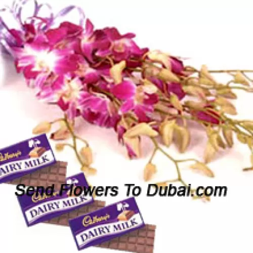 <b>Product Description</b><br><br>A Beautiful Bunch Of Pink Orchids Along With Assorted Cadbury Chocolates<br><br><b>Delivery Information</b><br><br>* The design and packaging of the product can always vary and is subject to the availability of flowers and other products available at the time of delivery.<br><br>* The "Time selected is treated as a preference/request and is not a fixed time for delivery". We only guarantee delivery on a "Specified Date" and not within a specified "Time Frame".