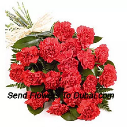 <b>Product Description</b><br><br>A Beautiful Bunch Of 24 Red Carnations With Seasonal Fillers<br><br><b>Delivery Information</b><br><br>* The design and packaging of the product can always vary and is subject to the availability of flowers and other products available at the time of delivery.<br><br>* The "Time selected is treated as a preference/request and is not a fixed time for delivery". We only guarantee delivery on a "Specified Date" and not within a specified "Time Frame".