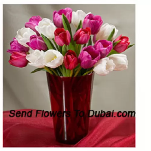 <b>Product Description</b><br><br>Mixed Colored Tulips With Seasonal Fillers In A Glass Vase - Please Note That In Case Of Non-Availability Of Certain Seasonal Flowers The Same Will Be Substituted With Other Flowers Of Same Value<br><br><b>Delivery Information</b><br><br>* The design and packaging of the product can always vary and is subject to the availability of flowers and other products available at the time of delivery.<br><br>* The "Time selected is treated as a preference/request and is not a fixed time for delivery". We only guarantee delivery on a "Specified Date" and not within a specified "Time Frame".