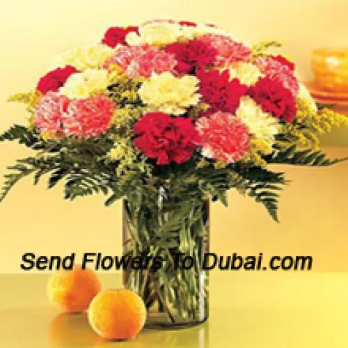 <b>Product Description</b><br><br>24 Mixed Colored Carnations With Seasonal Fillers In A Glass Vase<br><br><b>Delivery Information</b><br><br>* The design and packaging of the product can always vary and is subject to the availability of flowers and other products available at the time of delivery.<br><br>* The "Time selected is treated as a preference/request and is not a fixed time for delivery". We only guarantee delivery on a "Specified Date" and not within a specified "Time Frame".