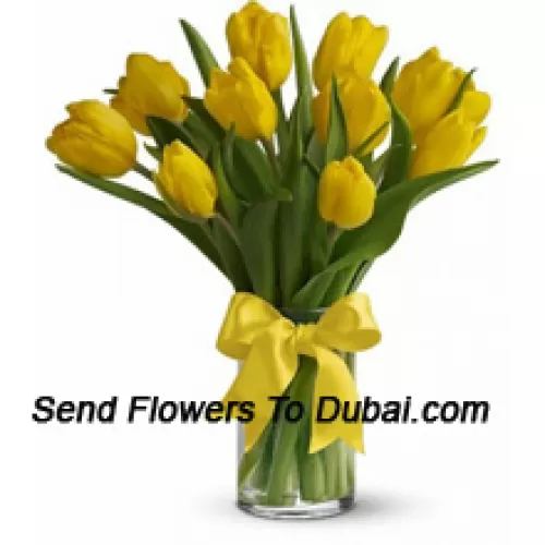 <b>Product Description</b><br><br>Yellow Tulips With Seasonal Fillers And Leaves In A Glass Vase - Please Note That In Case Of Non-Availability Of Certain Seasonal Flowers The Same Will Be Substituted With Other Flowers Of Same Value<br><br><b>Delivery Information</b><br><br>* The design and packaging of the product can always vary and is subject to the availability of flowers and other products available at the time of delivery.<br><br>* The "Time selected is treated as a preference/request and is not a fixed time for delivery". We only guarantee delivery on a "Specified Date" and not within a specified "Time Frame".