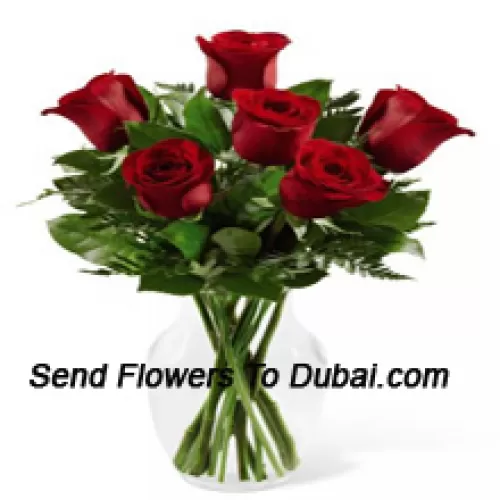<b>Product Description</b><br><br>6 Red Roses With Some Ferns In A Glass Vase<br><br><b>Delivery Information</b><br><br>* The design and packaging of the product can always vary and is subject to the availability of flowers and other products available at the time of delivery.<br><br>* The "Time selected is treated as a preference/request and is not a fixed time for delivery". We only guarantee delivery on a "Specified Date" and not within a specified "Time Frame".