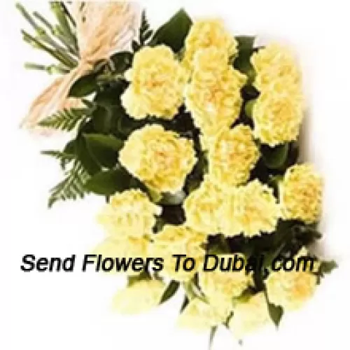 <b>Product Description</b><br><br>Bunch Of 18 Yellow Carnations With Seasonal Fillers<br><br><b>Delivery Information</b><br><br>* The design and packaging of the product can always vary and is subject to the availability of flowers and other products available at the time of delivery.<br><br>* The "Time selected is treated as a preference/request and is not a fixed time for delivery". We only guarantee delivery on a "Specified Date" and not within a specified "Time Frame".