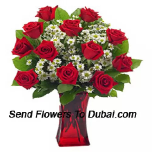 <b>Product Description</b><br><br>12 Red Roses With Some Ferns In A Glass Vase<br><br><b>Delivery Information</b><br><br>* The design and packaging of the product can always vary and is subject to the availability of flowers and other products available at the time of delivery.<br><br>* The "Time selected is treated as a preference/request and is not a fixed time for delivery". We only guarantee delivery on a "Specified Date" and not within a specified "Time Frame".