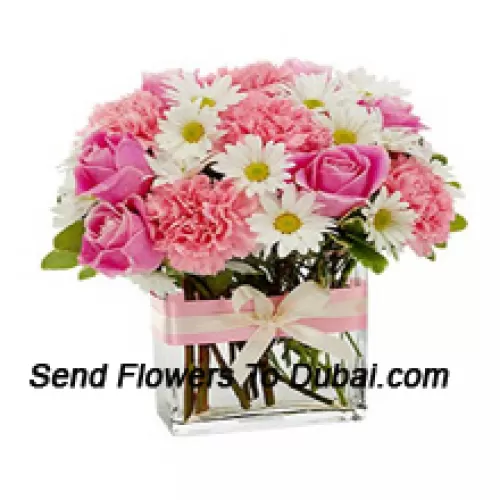 <b>Product Description</b><br><br>Pink Roses, Pink Carnations And Assorted White Seasonal Flowers Arranged Beautifully In A Glass Vase<br><br><b>Delivery Information</b><br><br>* The design and packaging of the product can always vary and is subject to the availability of flowers and other products available at the time of delivery.<br><br>* The "Time selected is treated as a preference/request and is not a fixed time for delivery". We only guarantee delivery on a "Specified Date" and not within a specified "Time Frame".