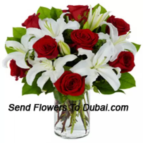 <b>Product Description</b><br><br>Red Roses And White Lilies With Seasonal Fillers In A Glass Vase<br><br><b>Delivery Information</b><br><br>* The design and packaging of the product can always vary and is subject to the availability of flowers and other products available at the time of delivery.<br><br>* The "Time selected is treated as a preference/request and is not a fixed time for delivery". We only guarantee delivery on a "Specified Date" and not within a specified "Time Frame".