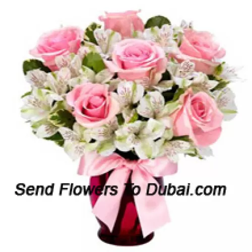 <b>Product Description</b><br><br>Pink Roses And White Alstroemeria Arrannged Beautifully In A Glass Vase<br><br><b>Delivery Information</b><br><br>* The design and packaging of the product can always vary and is subject to the availability of flowers and other products available at the time of delivery.<br><br>* The "Time selected is treated as a preference/request and is not a fixed time for delivery". We only guarantee delivery on a "Specified Date" and not within a specified "Time Frame".
