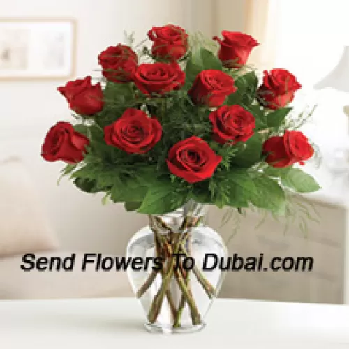 <b>Product Description</b><br><br>12 Red Roses With Some Ferns In A Glass Vase<br><br><b>Delivery Information</b><br><br>* The design and packaging of the product can always vary and is subject to the availability of flowers and other products available at the time of delivery.<br><br>* The "Time selected is treated as a preference/request and is not a fixed time for delivery". We only guarantee delivery on a "Specified Date" and not within a specified "Time Frame".