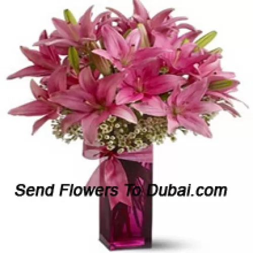 <b>Product Description</b><br><br>Beautiful Pink Lilies With Some Ferns In A Glass Vase<br><br><b>Delivery Information</b><br><br>* The design and packaging of the product can always vary and is subject to the availability of flowers and other products available at the time of delivery.<br><br>* The "Time selected is treated as a preference/request and is not a fixed time for delivery". We only guarantee delivery on a "Specified Date" and not within a specified "Time Frame".