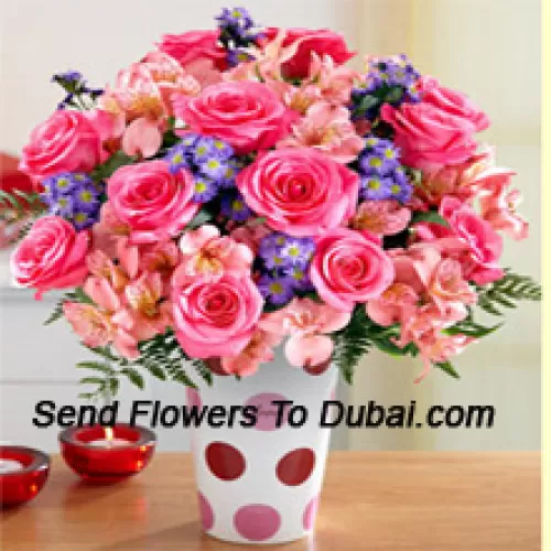 <b>Product Description</b><br><br>Pink Roses, Pink Orchids And Assorted Purple Flowers Arranged Beautifully In A Glass Vase<br><br><b>Delivery Information</b><br><br>* The design and packaging of the product can always vary and is subject to the availability of flowers and other products available at the time of delivery.<br><br>* The "Time selected is treated as a preference/request and is not a fixed time for delivery". We only guarantee delivery on a "Specified Date" and not within a specified "Time Frame".