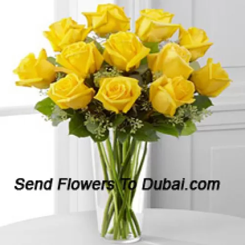 <b>Product Description</b><br><br>12 Yellow Roses With Some Ferns In A Glass Vase<br><br><b>Delivery Information</b><br><br>* The design and packaging of the product can always vary and is subject to the availability of flowers and other products available at the time of delivery.<br><br>* The "Time selected is treated as a preference/request and is not a fixed time for delivery". We only guarantee delivery on a "Specified Date" and not within a specified "Time Frame".