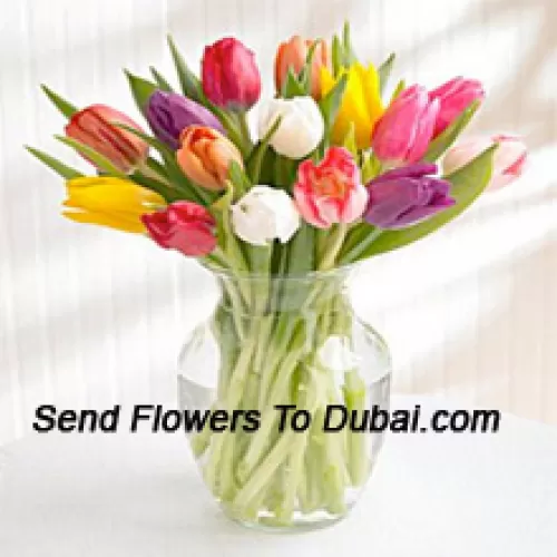 <b>Product Description</b><br><br>Mixed Colored Tulips In A Glass Vase - Please Note That In Case Of Non-Availability Of Certain Seasonal Flowers The Same Will Be Substituted With Other Flowers Of Same Value<br><br><b>Delivery Information</b><br><br>* The design and packaging of the product can always vary and is subject to the availability of flowers and other products available at the time of delivery.<br><br>* The "Time selected is treated as a preference/request and is not a fixed time for delivery". We only guarantee delivery on a "Specified Date" and not within a specified "Time Frame".