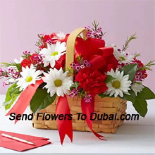 <b>Product Description</b><br><br>A Beautiful Arrangement Of White Gerberas And Red Carnations With Seasonal Fillers<br><br><b>Delivery Information</b><br><br>* The design and packaging of the product can always vary and is subject to the availability of flowers and other products available at the time of delivery.<br><br>* The "Time selected is treated as a preference/request and is not a fixed time for delivery". We only guarantee delivery on a "Specified Date" and not within a specified "Time Frame".