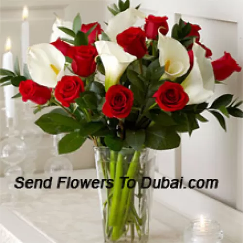 <b>Product Description</b><br><br>Red Roses And White Lilies With Some Ferns In A Glass Vase<br><br><b>Delivery Information</b><br><br>* The design and packaging of the product can always vary and is subject to the availability of flowers and other products available at the time of delivery.<br><br>* The "Time selected is treated as a preference/request and is not a fixed time for delivery". We only guarantee delivery on a "Specified Date" and not within a specified "Time Frame".