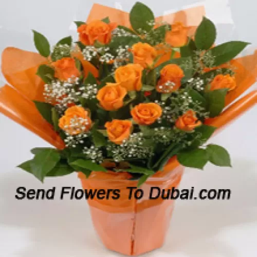 <b>Product Description</b><br><br>A Beautiful Arrangement Of 18 Orange Roses With Seasonal Fillers<br><br><b>Delivery Information</b><br><br>* The design and packaging of the product can always vary and is subject to the availability of flowers and other products available at the time of delivery.<br><br>* The "Time selected is treated as a preference/request and is not a fixed time for delivery". We only guarantee delivery on a "Specified Date" and not within a specified "Time Frame".