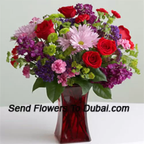 <b>Product Description</b><br><br>Red Roses, Pink Carnations And Other Assorted Seasonal Flowers In A Glass Vase<br><br><b>Delivery Information</b><br><br>* The design and packaging of the product can always vary and is subject to the availability of flowers and other products available at the time of delivery.<br><br>* The "Time selected is treated as a preference/request and is not a fixed time for delivery". We only guarantee delivery on a "Specified Date" and not within a specified "Time Frame".