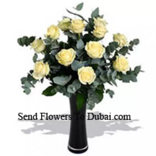 <b>Product Description</b><br><br>12 White Roses With Some Ferns In A Vase<br><br><b>Delivery Information</b><br><br>* The design and packaging of the product can always vary and is subject to the availability of flowers and other products available at the time of delivery.<br><br>* The "Time selected is treated as a preference/request and is not a fixed time for delivery". We only guarantee delivery on a "Specified Date" and not within a specified "Time Frame".