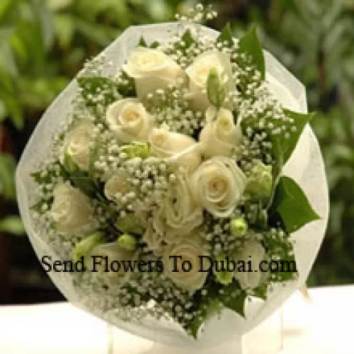 <b>Product Description</b><br><br>Bunch Of 12 White Roses With Fillers<br><br><b>Delivery Information</b><br><br>* The design and packaging of the product can always vary and is subject to the availability of flowers and other products available at the time of delivery.<br><br>* The "Time selected is treated as a preference/request and is not a fixed time for delivery". We only guarantee delivery on a "Specified Date" and not within a specified "Time Frame".