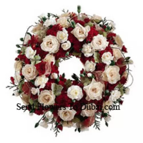 <b>Product Description</b><br><br>Mixed Flower Wreath<br><br><b>Delivery Information</b><br><br>* The design and packaging of the product can always vary and is subject to the availability of flowers and other products available at the time of delivery.<br><br>* The "Time selected is treated as a preference/request and is not a fixed time for delivery". We only guarantee delivery on a "Specified Date" and not within a specified "Time Frame".