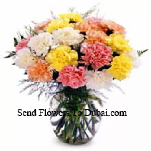 <b>Product Description</b><br><br>12 Mixed Colored Carnations In A Vase<br><br><b>Delivery Information</b><br><br>* The design and packaging of the product can always vary and is subject to the availability of flowers and other products available at the time of delivery.<br><br>* The "Time selected is treated as a preference/request and is not a fixed time for delivery". We only guarantee delivery on a "Specified Date" and not within a specified "Time Frame".