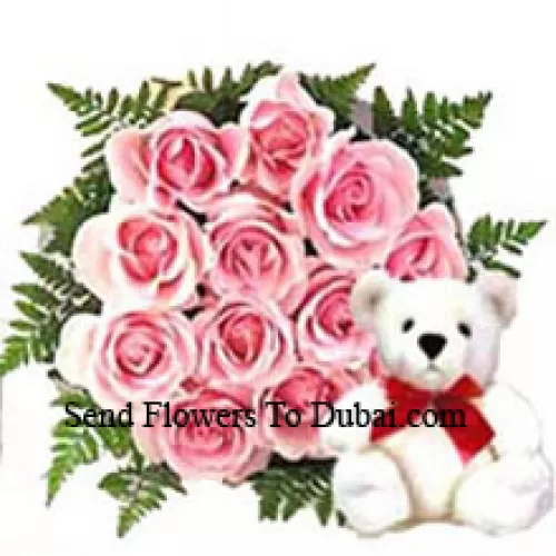 <b>Product Description</b><br><br>Bunch Of 12 Pink Roses With A Cute Teddy Bear<br><br><b>Delivery Information</b><br><br>* The design and packaging of the product can always vary and is subject to the availability of flowers and other products available at the time of delivery.<br><br>* The "Time selected is treated as a preference/request and is not a fixed time for delivery". We only guarantee delivery on a "Specified Date" and not within a specified "Time Frame".