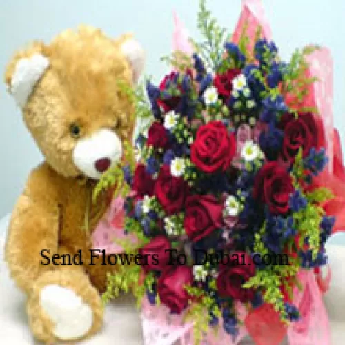 <b>Product Description</b><br><br>Bunch Of 12 Red Roses With Fillers And A Medium Sized Cute Teddy Bear<br><br><b>Delivery Information</b><br><br>* The design and packaging of the product can always vary and is subject to the availability of flowers and other products available at the time of delivery.<br><br>* The "Time selected is treated as a preference/request and is not a fixed time for delivery". We only guarantee delivery on a "Specified Date" and not within a specified "Time Frame".
