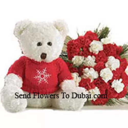 <b>Product Description</b><br><br>Bunch Of 24 Red And White Carnations With A Medium Sized Cute Teddy Bear<br><br><b>Delivery Information</b><br><br>* The design and packaging of the product can always vary and is subject to the availability of flowers and other products available at the time of delivery.<br><br>* The "Time selected is treated as a preference/request and is not a fixed time for delivery". We only guarantee delivery on a "Specified Date" and not within a specified "Time Frame".