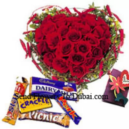 <b>Product Description</b><br><br>Heart Shaped Arrangement Of 40 Red Roses, Assorted Chocolates And A Free Greeting Card<br><br><b>Delivery Information</b><br><br>* The design and packaging of the product can always vary and is subject to the availability of flowers and other products available at the time of delivery.<br><br>* The "Time selected is treated as a preference/request and is not a fixed time for delivery". We only guarantee delivery on a "Specified Date" and not within a specified "Time Frame".