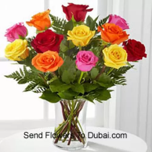 <b>Product Description</b><br><br>12 Mixed Colored Roses With Some Ferns in A Vase<br><br><b>Delivery Information</b><br><br>* The design and packaging of the product can always vary and is subject to the availability of flowers and other products available at the time of delivery.<br><br>* The "Time selected is treated as a preference/request and is not a fixed time for delivery". We only guarantee delivery on a "Specified Date" and not within a specified "Time Frame".