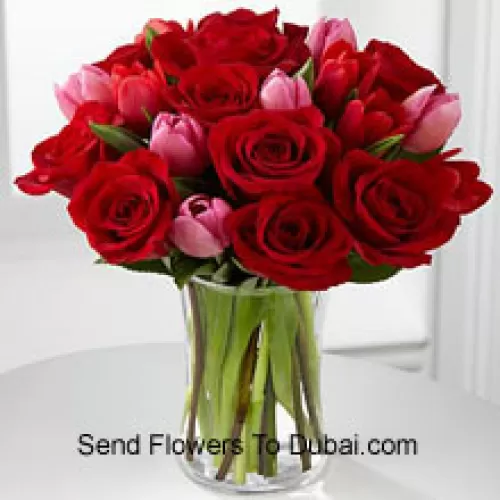<b>Product Description</b><br><br>12 Red Roses And 6 Pink Tulips With Some Seasonal Fillers In A Glass Vase<br><br><b>Delivery Information</b><br><br>* The design and packaging of the product can always vary and is subject to the availability of flowers and other products available at the time of delivery.<br><br>* The "Time selected is treated as a preference/request and is not a fixed time for delivery". We only guarantee delivery on a "Specified Date" and not within a specified "Time Frame".