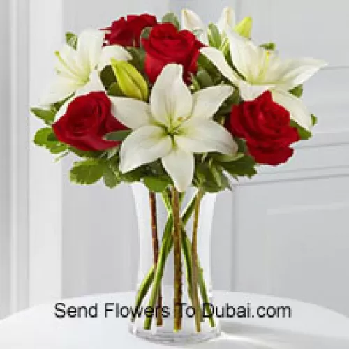 <b>Product Description</b><br><br>Red Roses And White Lilies With Some Seasonal Fillers In A Glass Vase<br><br><b>Delivery Information</b><br><br>* The design and packaging of the product can always vary and is subject to the availability of flowers and other products available at the time of delivery.<br><br>* The "Time selected is treated as a preference/request and is not a fixed time for delivery". We only guarantee delivery on a "Specified Date" and not within a specified "Time Frame".