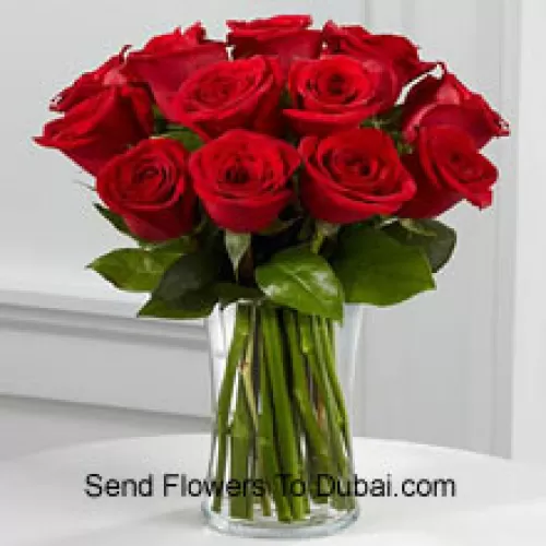 <b>Product Description</b><br><br>12 Red Roses With Some Ferns In A Vase<br><br><b>Delivery Information</b><br><br>* The design and packaging of the product can always vary and is subject to the availability of flowers and other products available at the time of delivery.<br><br>* The "Time selected is treated as a preference/request and is not a fixed time for delivery". We only guarantee delivery on a "Specified Date" and not within a specified "Time Frame".