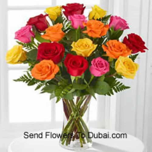 <b>Product Description</b><br><br>18 Mixed Colored Roses With Seasonal Fillers In A Glass Vase<br><br><b>Delivery Information</b><br><br>* The design and packaging of the product can always vary and is subject to the availability of flowers and other products available at the time of delivery.<br><br>* The "Time selected is treated as a preference/request and is not a fixed time for delivery". We only guarantee delivery on a "Specified Date" and not within a specified "Time Frame".