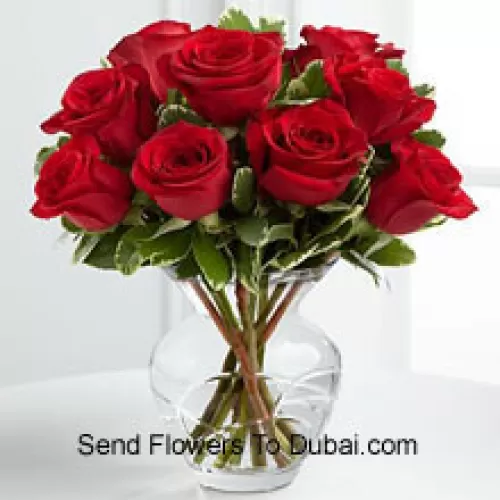 <b>Product Description</b><br><br>10 Red Roses With Some Ferns In A Vase<br><br><b>Delivery Information</b><br><br>* The design and packaging of the product can always vary and is subject to the availability of flowers and other products available at the time of delivery.<br><br>* The "Time selected is treated as a preference/request and is not a fixed time for delivery". We only guarantee delivery on a "Specified Date" and not within a specified "Time Frame".