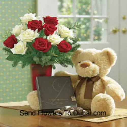 <b>Product Description</b><br><br>6 Red And 6 White Roses With Some Ferns In A Vase, A Cute Light Brown 10 Inches Teddy Bear And A Box Of Chocolates<br><br><b>Delivery Information</b><br><br>* The design and packaging of the product can always vary and is subject to the availability of flowers and other products available at the time of delivery.<br><br>* The "Time selected is treated as a preference/request and is not a fixed time for delivery". We only guarantee delivery on a "Specified Date" and not within a specified "Time Frame".