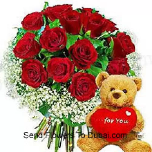 <b>Product Description</b><br><br>Bunch Of 12 Red Roses With Seasonal Fillers And A Cute Brown 8 Inches Teddy Bear<br><br><b>Delivery Information</b><br><br>* The design and packaging of the product can always vary and is subject to the availability of flowers and other products available at the time of delivery.<br><br>* The "Time selected is treated as a preference/request and is not a fixed time for delivery". We only guarantee delivery on a "Specified Date" and not within a specified "Time Frame".