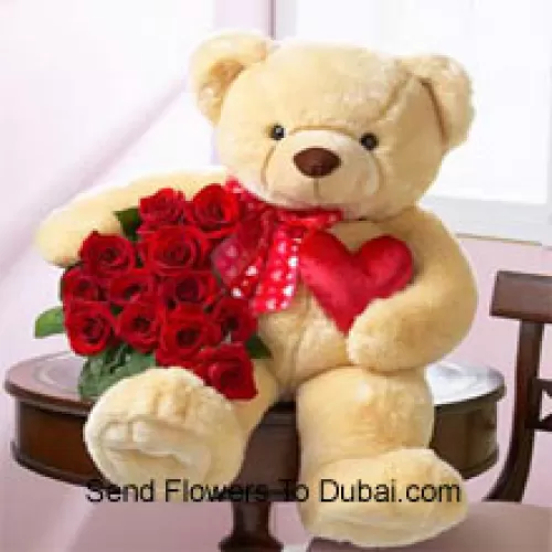 <b>Product Description</b><br><br>Bunch Of 12 Red Roses With A 24 Inches Tall Teddy Bear (Please Note That We Reserve The Right To Substitute The Teddy Bear With A Teddy Bear Of Equal Value And Size In Case Of Non-Availability Of The Same. Limited Stock. While Substituting The Product We Will Ensure That The Same Exclusivity Is Maintained)<br><br><b>Delivery Information</b><br><br>* The design and packaging of the product can always vary and is subject to the availability of flowers and other products available at the time of delivery.<br><br>* The "Time selected is treated as a preference/request and is not a fixed time for delivery". We only guarantee delivery on a "Specified Date" and not within a specified "Time Frame".