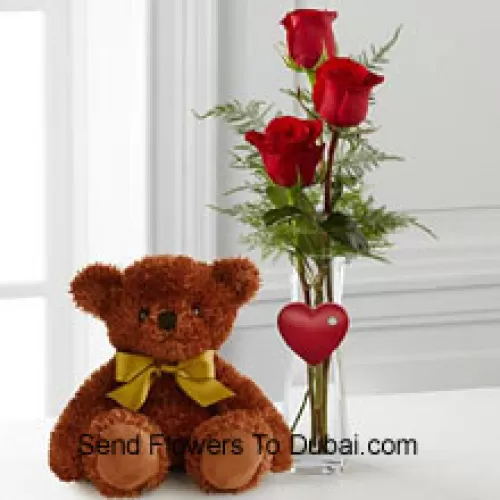 <b>Product Description</b><br><br>Three Red Roses In A Red Test Tube Vase And A Cute Brown 10 Inches Teddy Bear (We Reserve The Right To Substitute The Vase In Case Of Non-Availability. Limited Stock)<br><br><b>Delivery Information</b><br><br>* The design and packaging of the product can always vary and is subject to the availability of flowers and other products available at the time of delivery.<br><br>* The "Time selected is treated as a preference/request and is not a fixed time for delivery". We only guarantee delivery on a "Specified Date" and not within a specified "Time Frame".