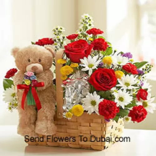 <b>Product Description</b><br><br>Basket Of Assorted Flowers And A Cute Brown 6 Inches Teddy Bear<br><br><b>Delivery Information</b><br><br>* The design and packaging of the product can always vary and is subject to the availability of flowers and other products available at the time of delivery.<br><br>* The "Time selected is treated as a preference/request and is not a fixed time for delivery". We only guarantee delivery on a "Specified Date" and not within a specified "Time Frame".