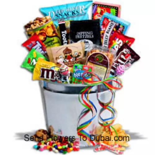 <b>Product Description</b><br><br>The ultimate junk food gift basket, inside there is a massive collection of snacks including caramelized almonds and popcorn, pretzels, chocolate chip cookies, kettle chips, trail mix, chocolate caramel bites, along with classics like Twizzlers, Tootsie Rolls, Blo Pops, Jelly Beans, Skittles, Smarties, and Nerds etc!  (Please Note That We Reserve The Right To Substitute Any Product With A Suitable Product Of Equal Value In Case Of Non-Availability Of A Certain Product)<br><br><b>Delivery Information</b><br><br>* The design and packaging of the product can always vary and is subject to the availability of flowers and other products available at the time of delivery.<br><br>* The "Time selected is treated as a preference/request and is not a fixed time for delivery". We only guarantee delivery on a "Specified Date" and not within a specified "Time Frame".