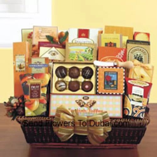 Our EID Gift Basket is perfect when you need to send a large gift and insure there is plenty of variety for her to enjoy. Our wicker tray basket is brimming with gourmet goodies that she will appreciate, like California smoked almonds, Lindt truffles, a Ghirardelli caramel chocolate bar, Dolcetto wafer cookies, dried fruit, cashew crunch, cheese straws, carrot cake cookies, breadsticks, cheese, a cheese knife, crackers, English toffee, cookies, English tea cookies, toffee pretzels, toffee almonds, LeGrand truffles, and cappuccino mix. (Please Note That We Reserve The Right To Substitute Any Product With A Suitable Product Of Equal Value In Case Of Non-Availability Of A Certain Product)